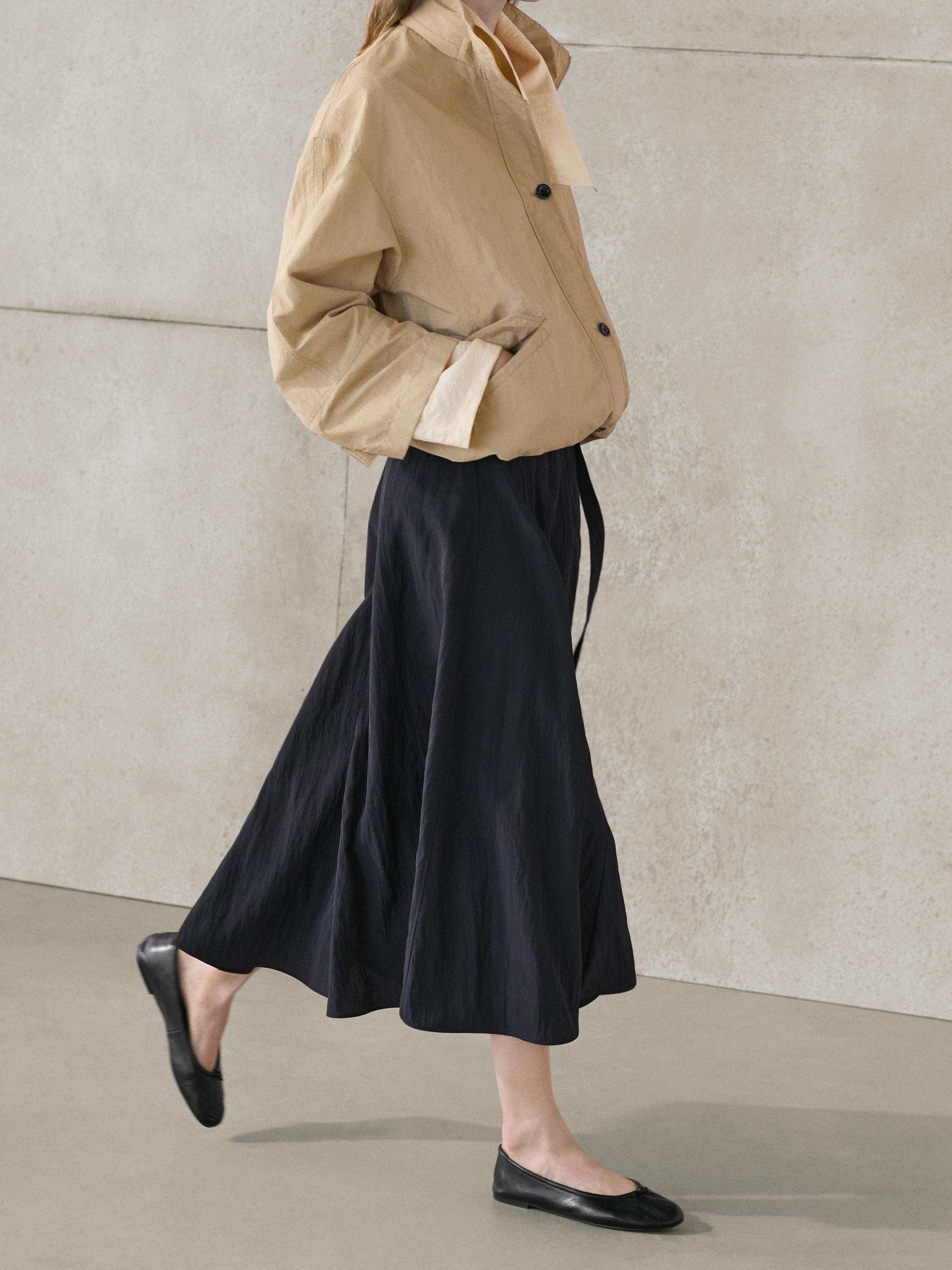 Long skirt with belt detail